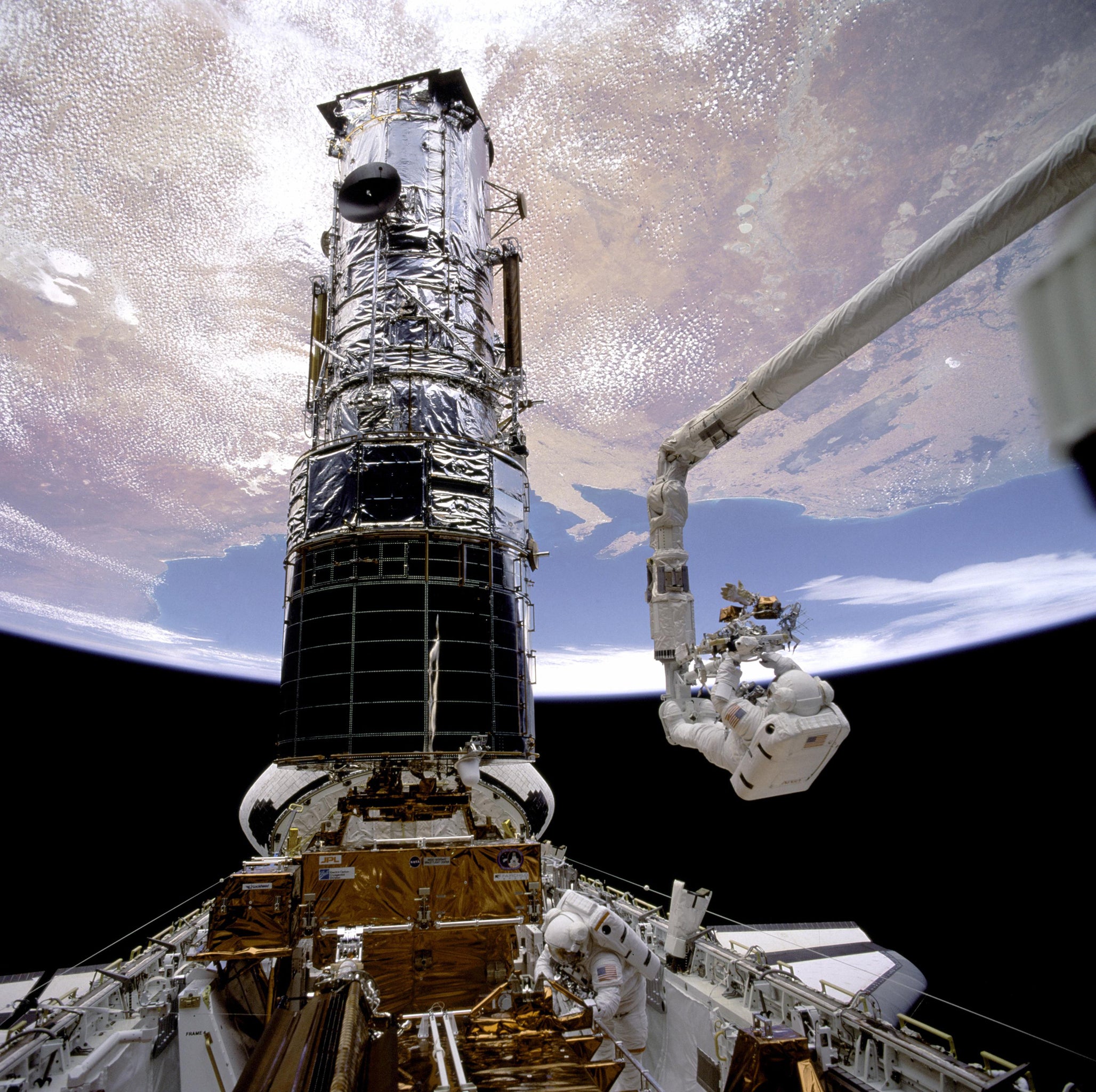 Astronauts repairing the Hubble Space Telescope Endeavour space shuttle, 1993 The Hubble Space Telescope was sent into space in 1990. Orbiting outside the distorting effects of the Earth’s atmosphere, it has taken the most breath-taking