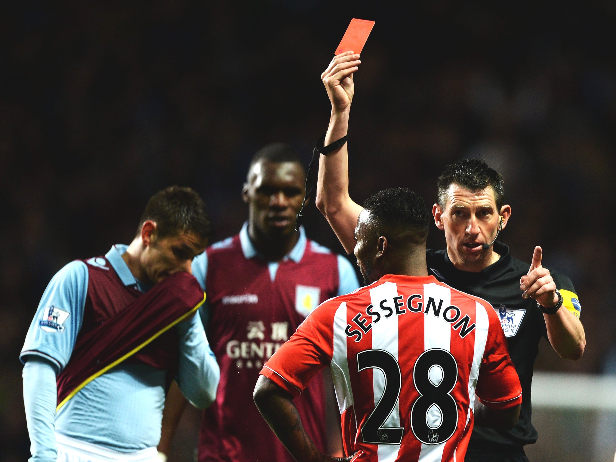 Stephane Sessegnon is sent off by match referee Lee Probert