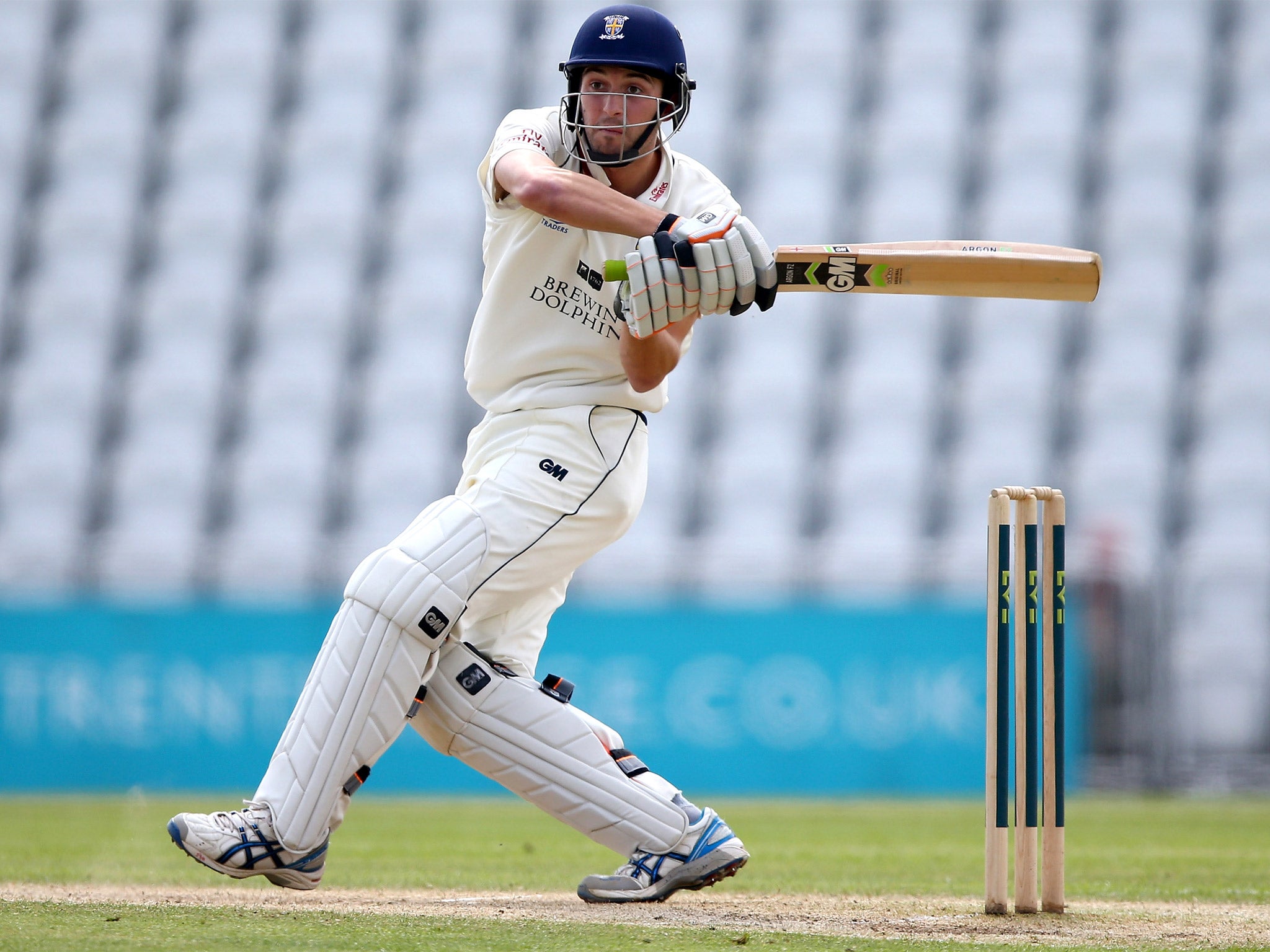 Durham’s Mark Wood on his way to an unbeaten 58 yesterday