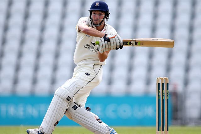 Durham’s Mark Wood on his way to an unbeaten 58 yesterday