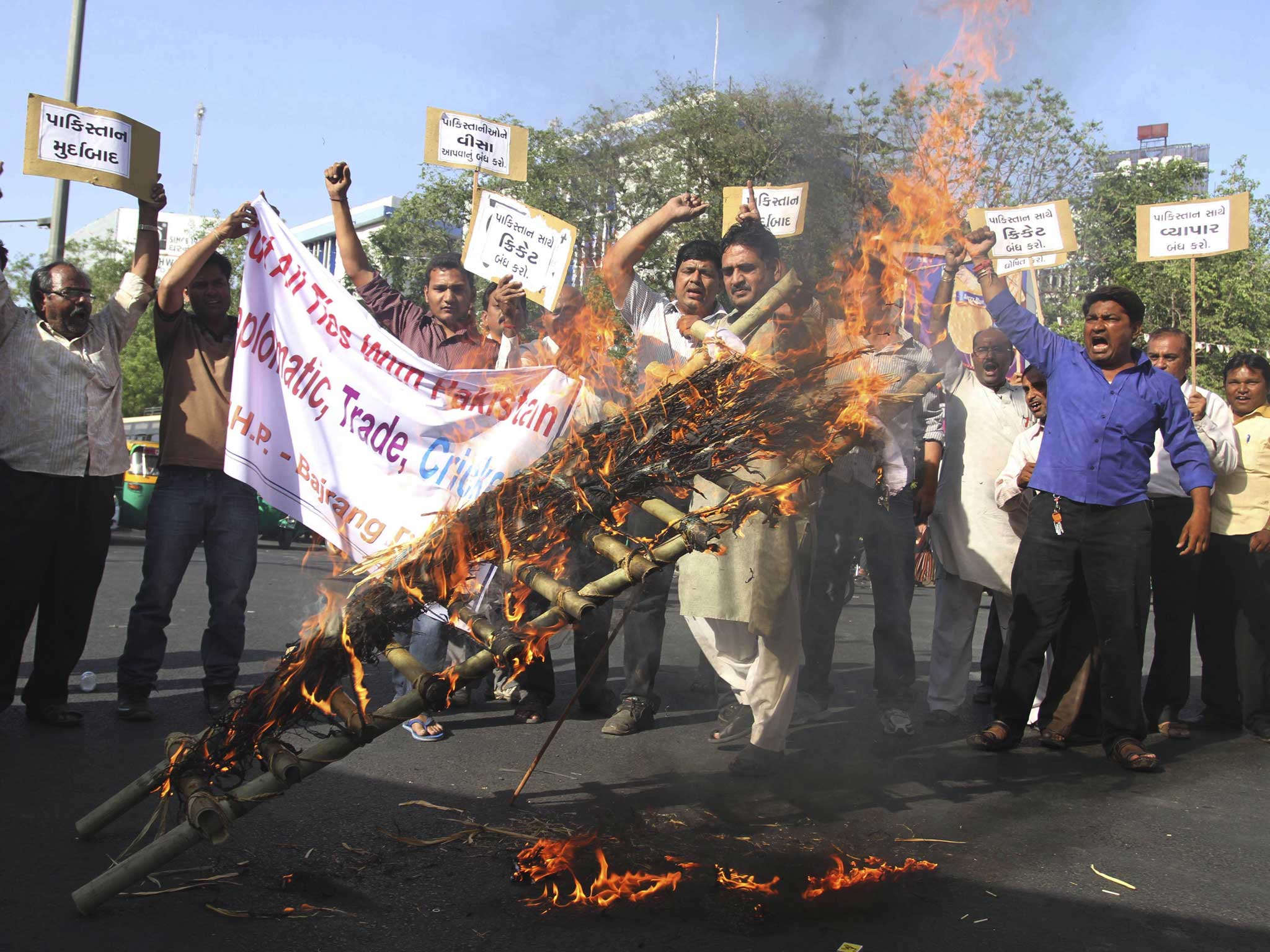Indian activists of right wing Hindu groups burn an effigy representing Pakistan after Sarabjit Singh, a convicted Indian spy who was on Pakistan's death row, died from a head injury