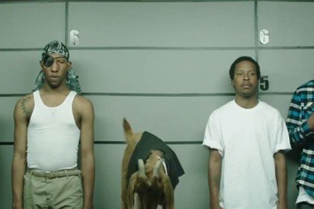 A still from the advert showing the line-up of suspects