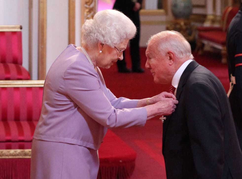 Stuart Hall is made an OBE by the Queen in March last year