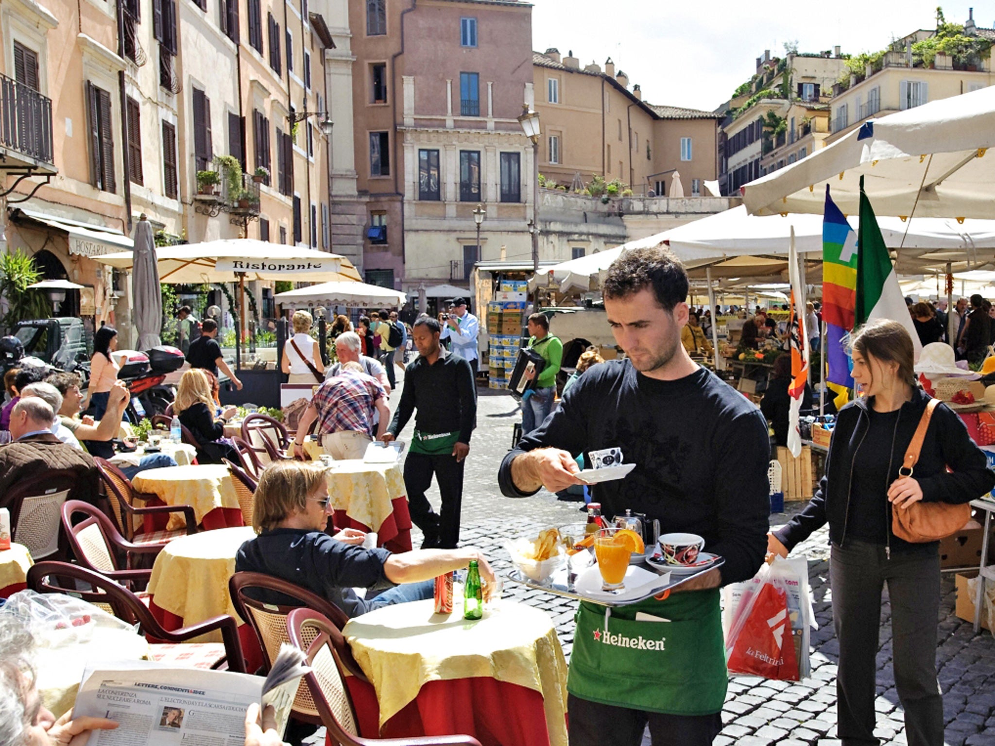Square meal: diners in the Campo de Fiori in Rome