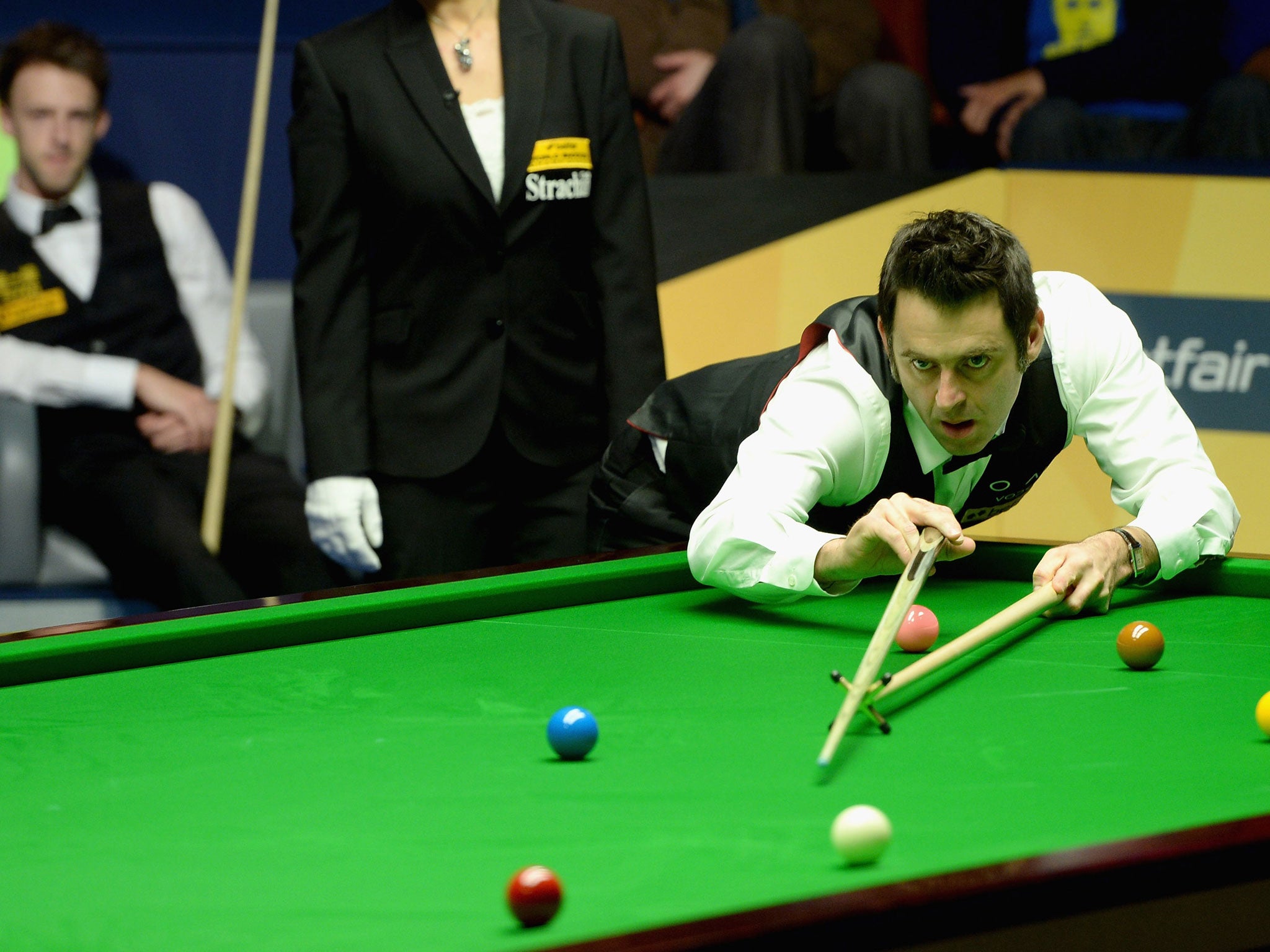 The defending champion Ronnie O’Sullivan in action yesterday