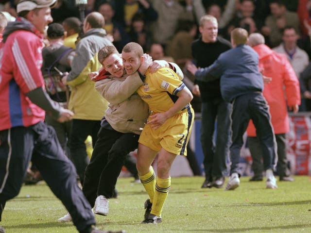 Palace’s Jamie Smith celebrates survival in 2001, ending an anxious time for Eagles fans