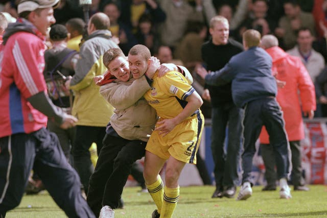 Palace’s Jamie Smith celebrates survival in 2001, ending an anxious time for Eagles fans