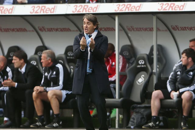 Roberto Mancini's disappointing season continues with a draw against Swansea