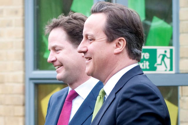 Don’t drop the ball: Nick Clegg and David Cameron in Wandsworth in March 