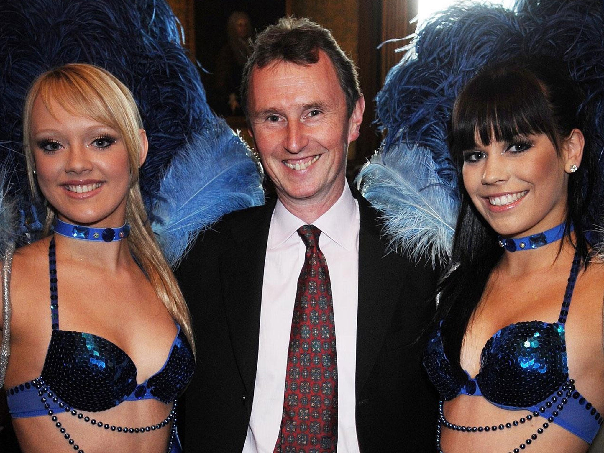 Arrested: Deputy Speaker Nigel Evans with dancers who visited the House of Commons in 2008.