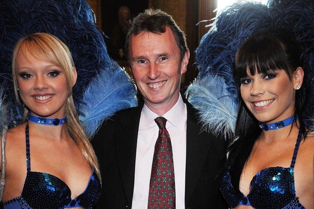 Arrested: Deputy Speaker Nigel Evans with dancers who visited the House of Commons in 2008.