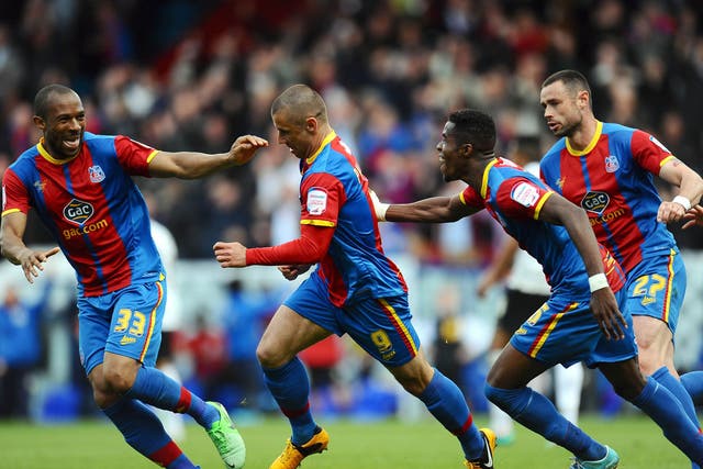 Kevin sent: Substitute Kevin Phlllips (second left) is congratulated by team-mates after putting Palace level at 2-2