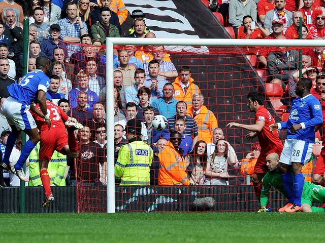Sylvain Distin's goal is ruled out after a foul on Jose Reina by Everton's Victor Anichebe