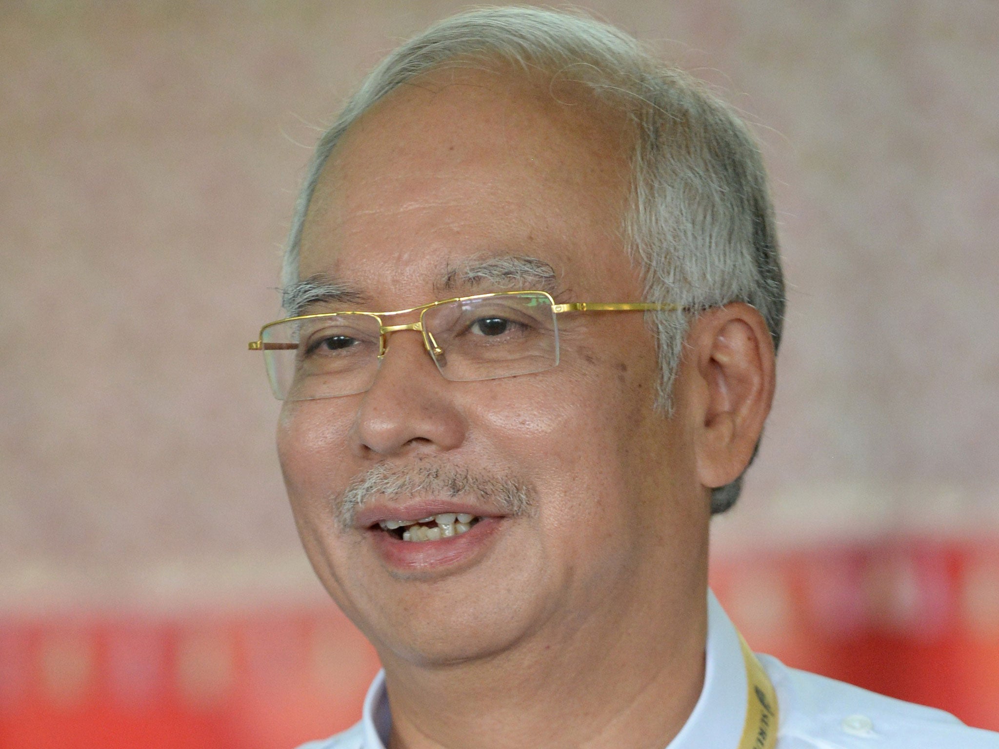 Prime Minister Najib Razak's National Front coalition captured 112 of Malaysia's 222 parliamentary seats