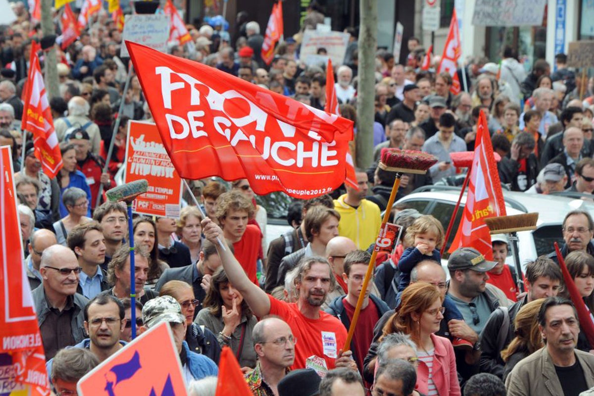 Thousands of leftist supporters march through Paris in protest over ...