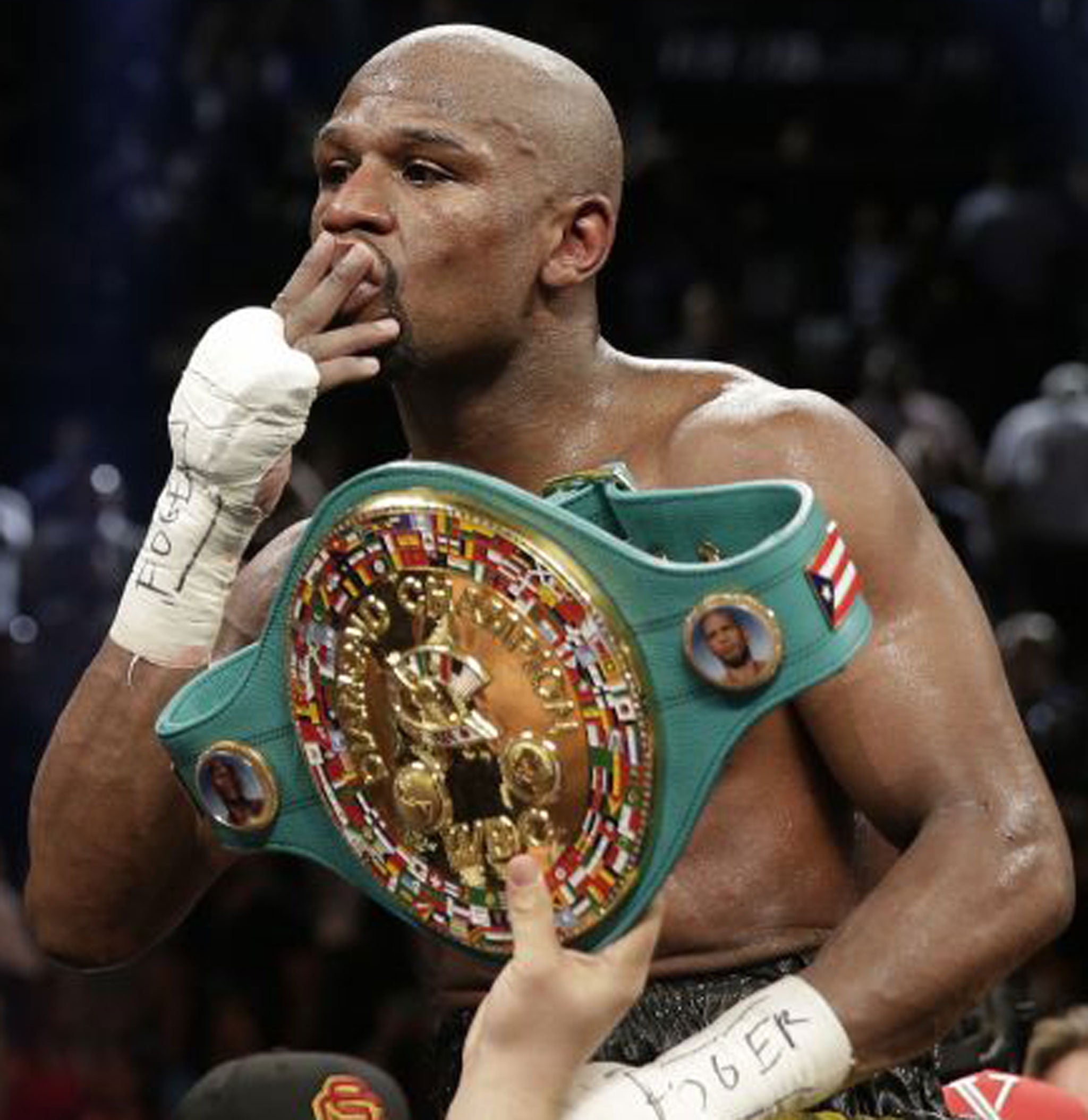 Floyd Mayweather celebrates another victory on Saturday