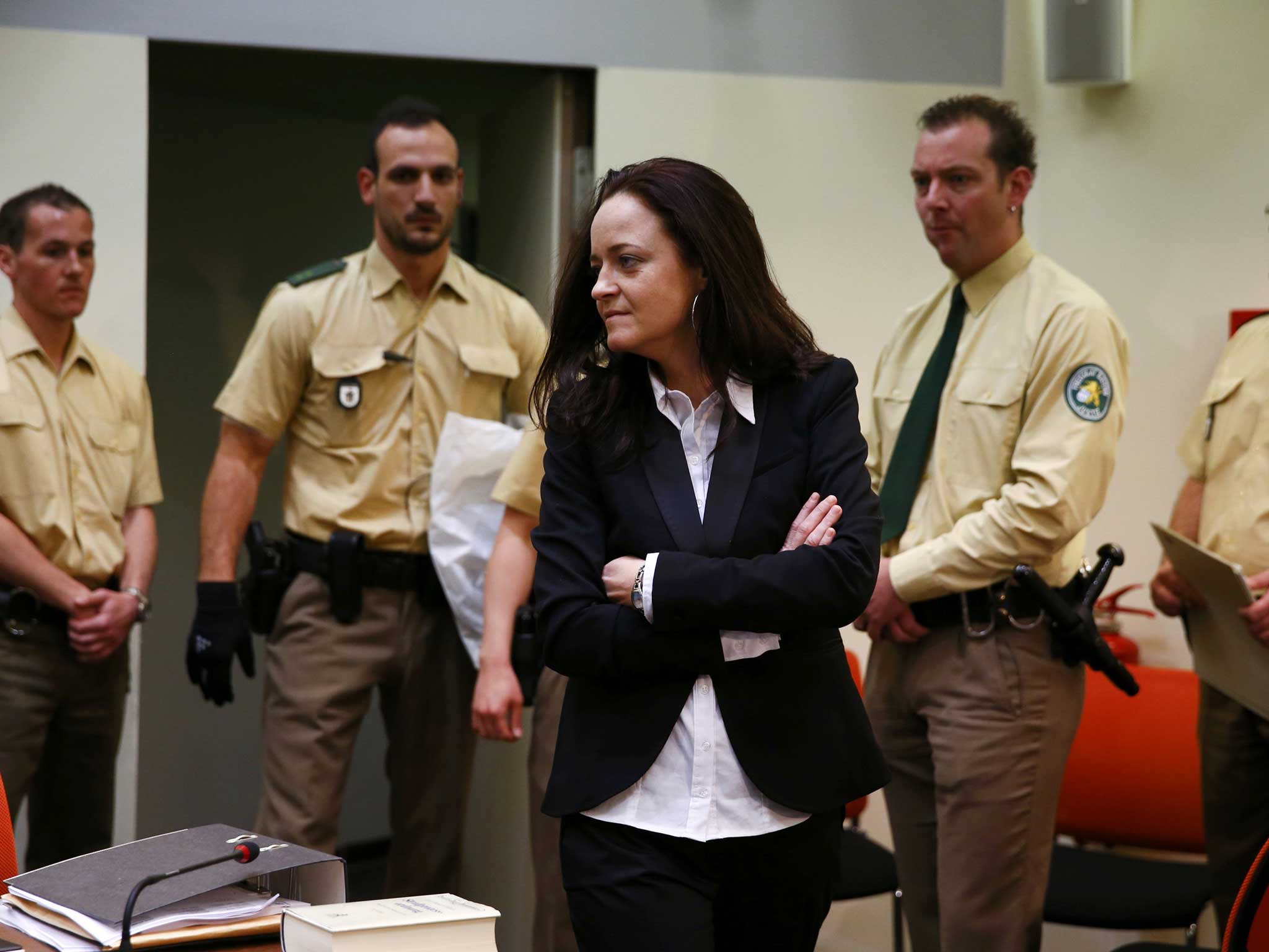 Beate Zschaepe, a member of the neo-Nazi group National Socialist Underground (NSU) stands in the court before the start of her trial