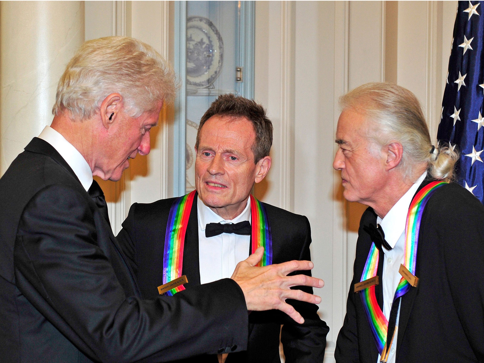 Bill Clinton with John Paul Jones and Jimmy Page as the band were made Kennedy honorees