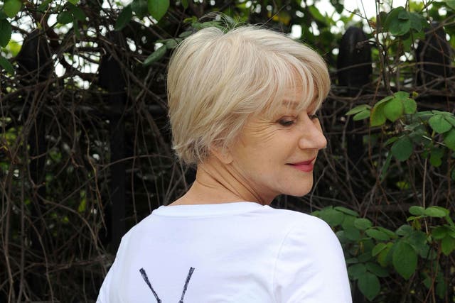 Dame Helen Mirren sought forgiveness for her dramatic outburst at a samba band performing outside London’s Gielgud Theatre on Saturday by sporting a homemade T-shirt promoting their cause
