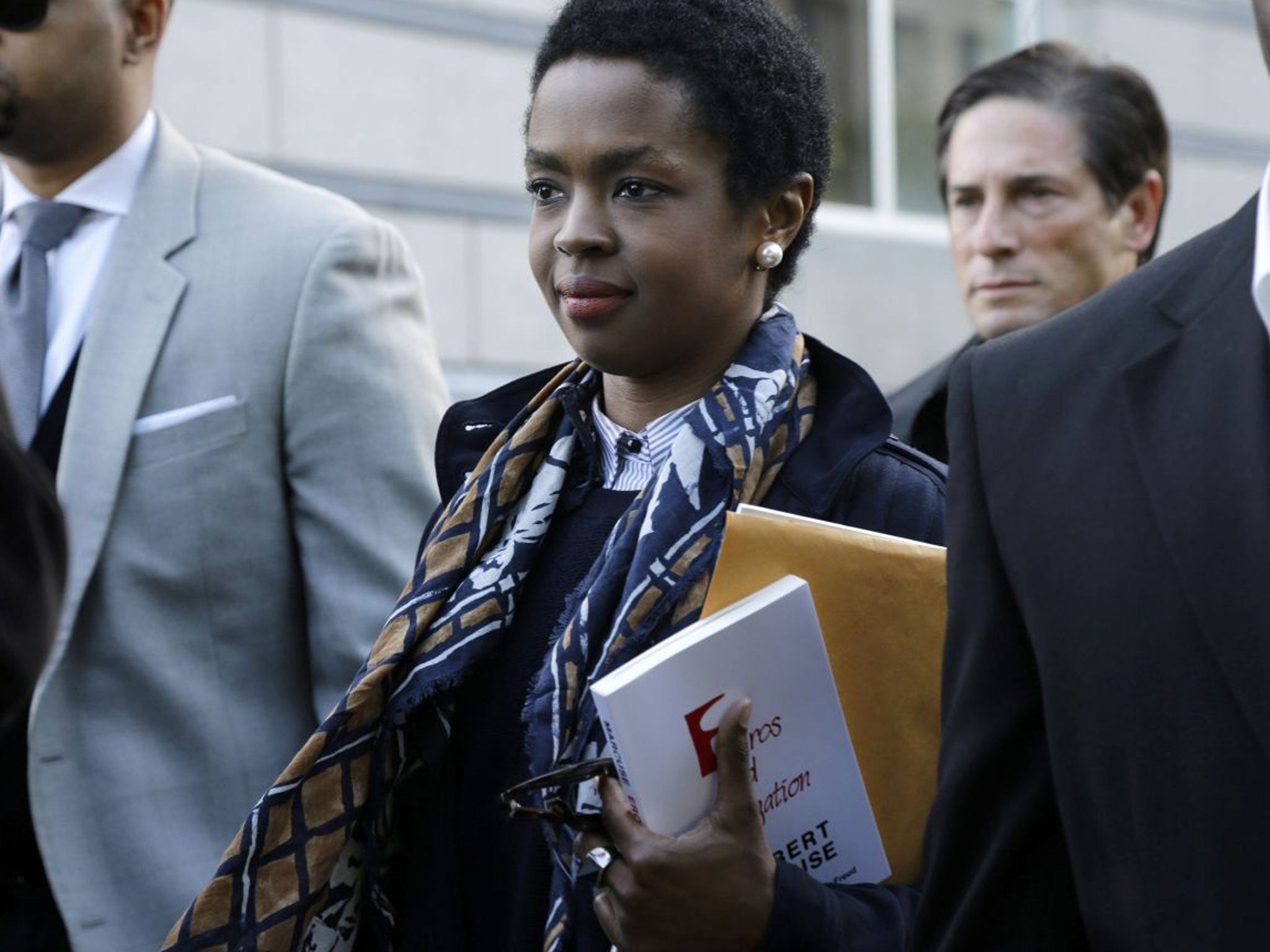 Eight-time Grammy Award winning singer Lauryn Hill leaves federal court in Newark, after sentencing in her tax evasion case. Hill was sentenced to three months in prison and an additional three months in home confinement for failing to pay taxes on about