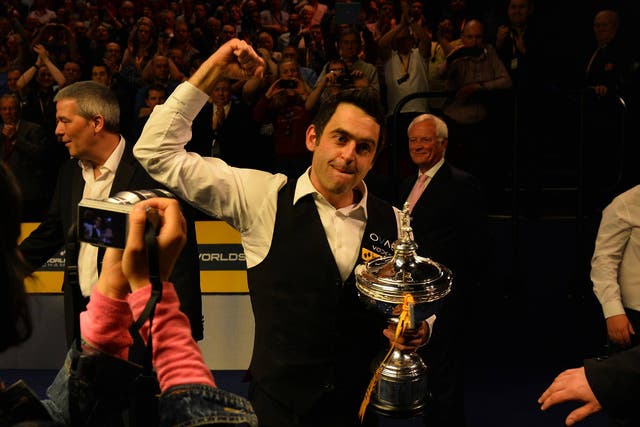 Ronnie O’Sullivan celebrates winning the world title at the Crucible