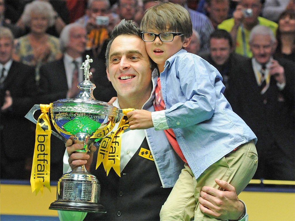 Ronnie O’Sullivan celebrates his World Championship win with son Ronnie