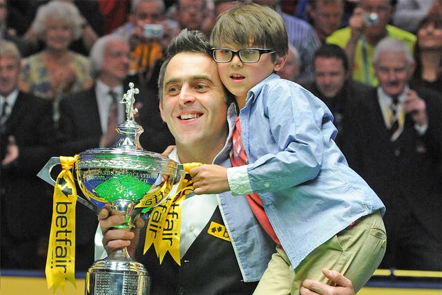 Ronnie O’Sullivan celebrates his World Championship win with son Ronnie