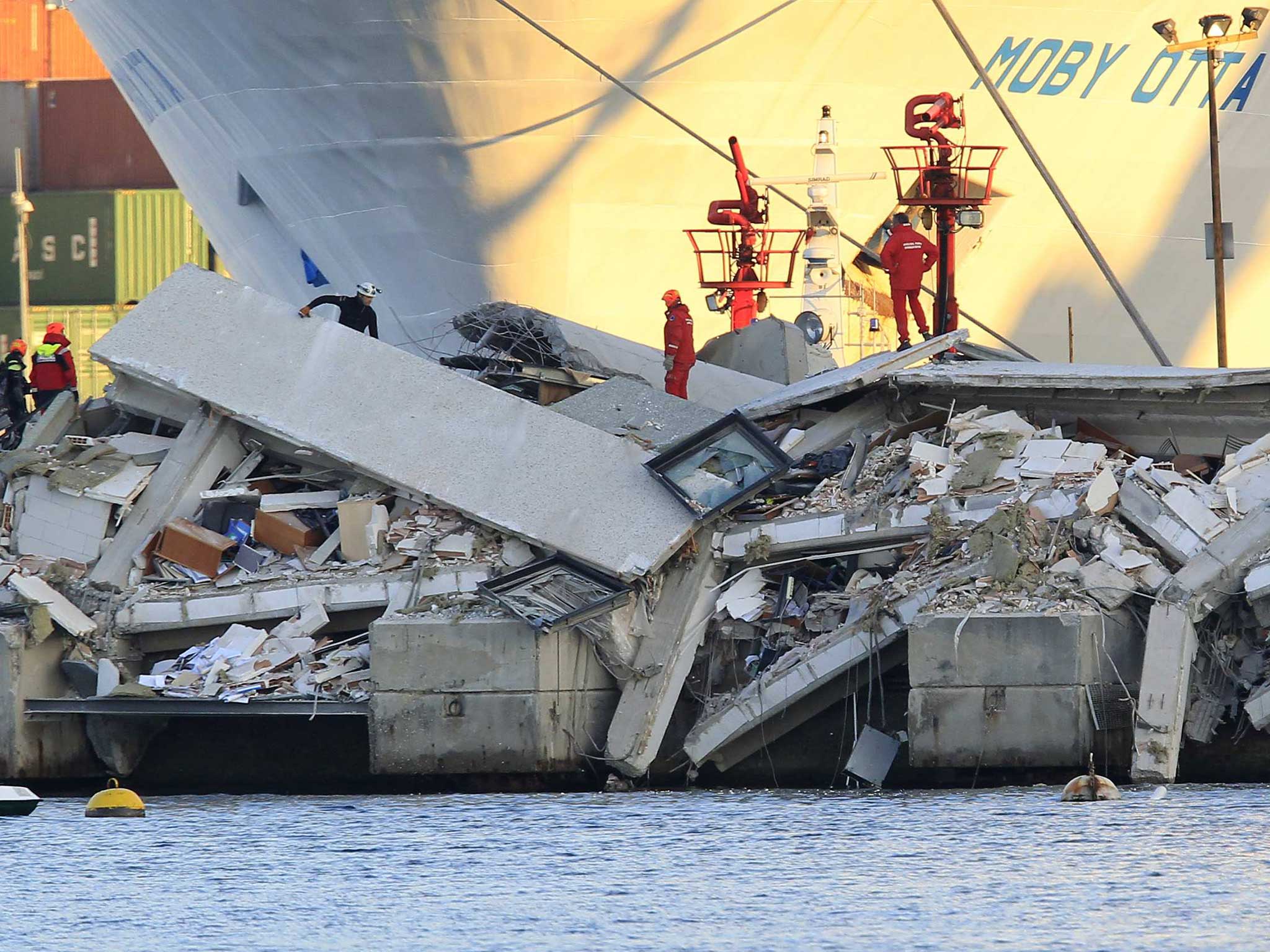 The collapsed control tower is pictured at Genoa's port