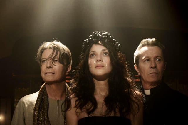 David Bowie, Marion Cotillard and Gary Oldman as they appear in a scene from the new Bowie video, directed  by Floria Sigismondi, for his latest song, The Next Day.