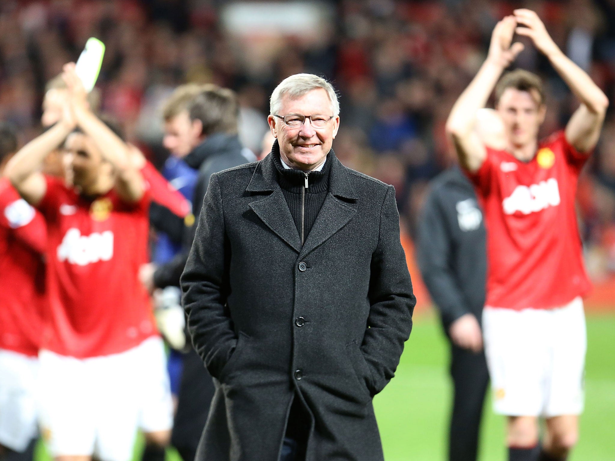 Manager Sir Alex Ferguson of Manchester United celebrates at final whistle of the Barclays Premier League match between Manchester United and Aston Villa at Old Trafford on April 22, 2013 in Manchester, England.