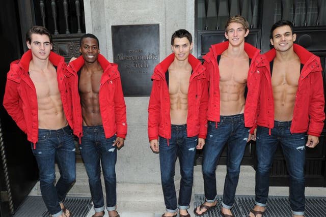 Male models outside an Abercrombie & Fitch store