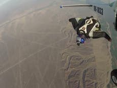 Video of wingsuit skydivers gliding over Nazca lines