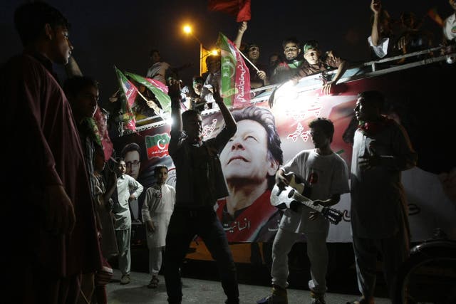 Supporters of Imran Khan at a rally in Karachi yesterday 