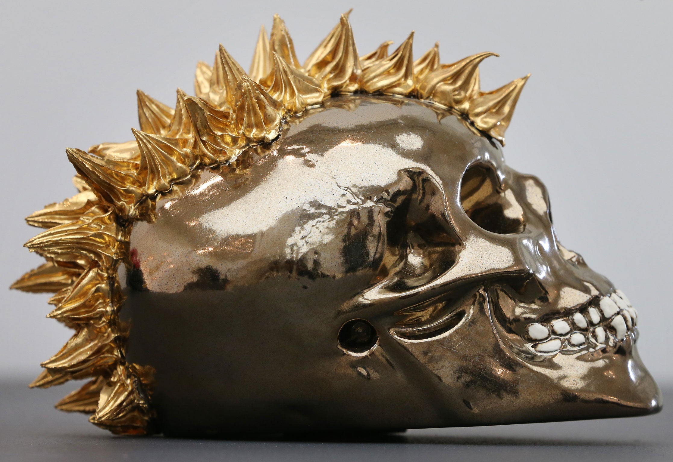 9 May 2013: Barbara Roling's earthenware skull is shown at the Collect art fair at Saatchi Gallery in London, England. Celebrating its 10th anniversary this year the Collect international art fair for contemporary objects, brings together galleries representing the work of numerous artists. Thirty two galleries and eleven Project Space artists have come together in the Saatchi Gallery