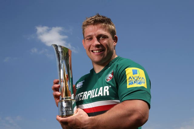 Tom Youngs of Leicester Tigers holds the Aviva Premiership Rugby Player of the Season trophy at the Leicester Tigers training ground