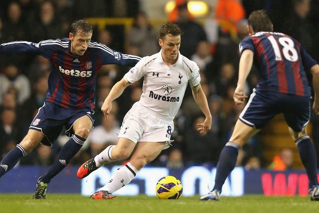 Scott Parker of Tottenham Hotspur is closed down by Peter Crouch and Dean Whitehead of Stoke City