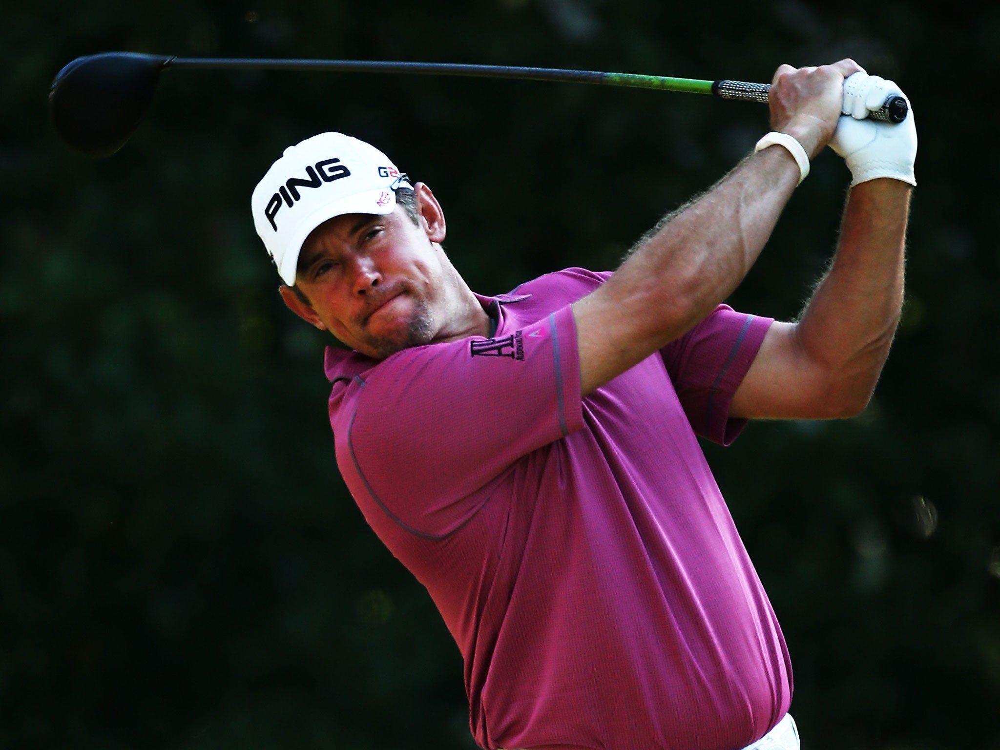Lee Westwood plays a shot at the 11th during his second round