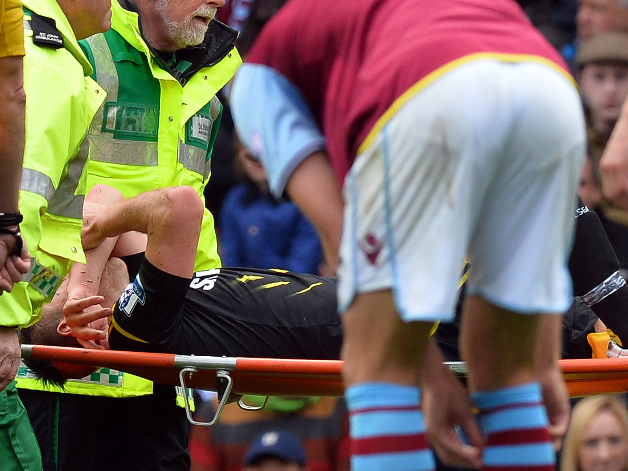 John Terry is taken off the pitch with an ankle injury during Chelsea's 2-1 victory over Aston Villa