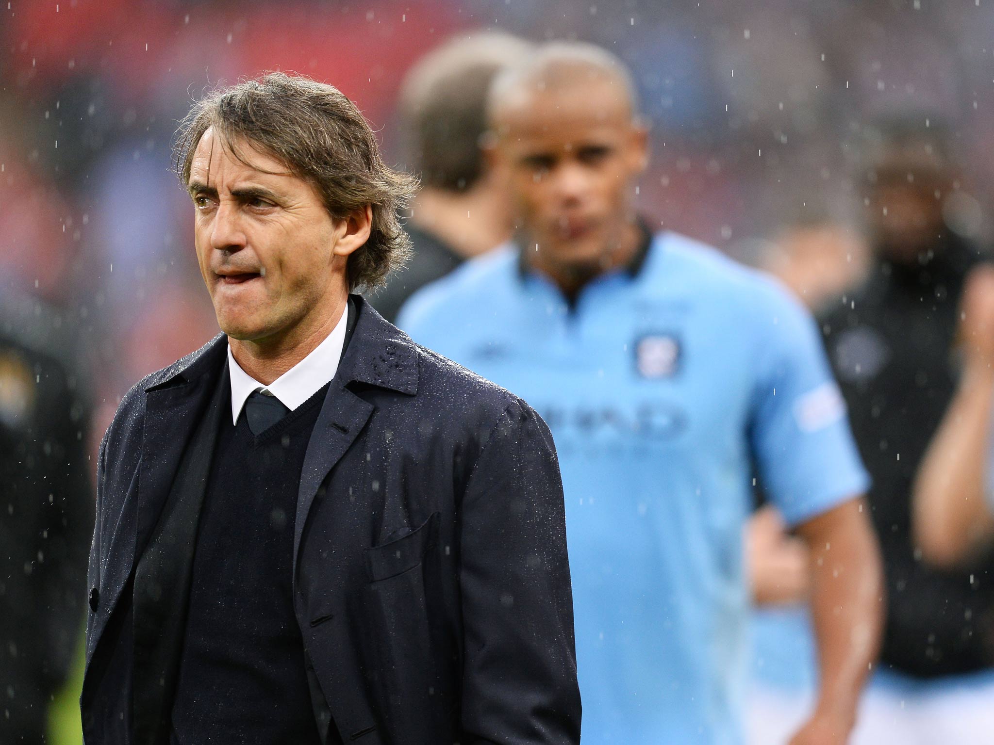 A dejected Roberto Mancini at Wembley following Manchester City's shock 1-0 loss to Wigan