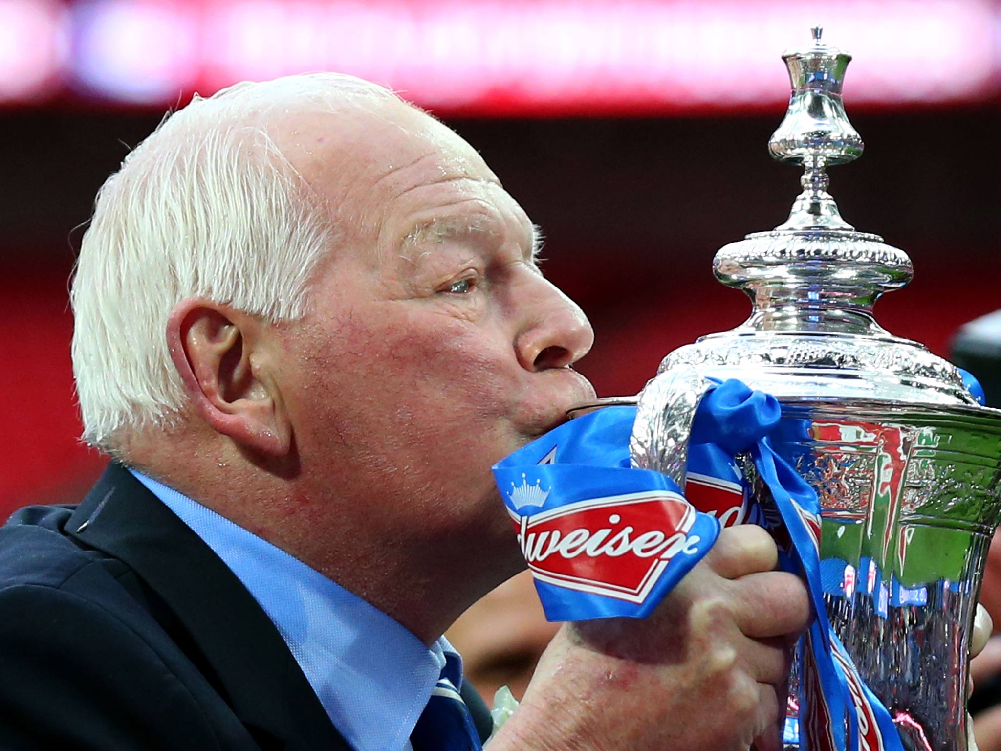 Wigan chairman Dave Whelan celebrates with the FA Cup trophy finally in his hands