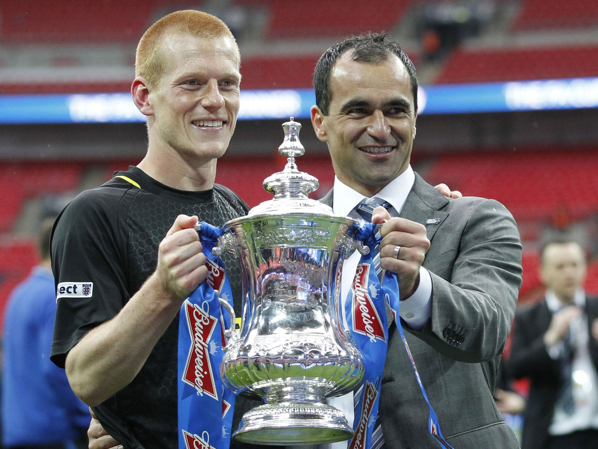 Roberto Martinez poses with goal scorer Ben Watson and the FA cup
