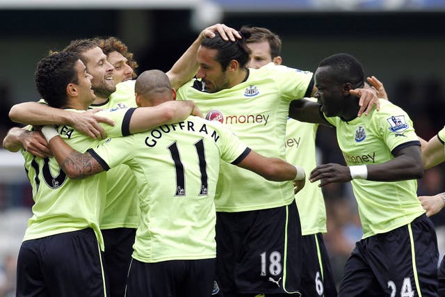 Newcastle players celebrate following their 2-1 win that secures their Premier League safety