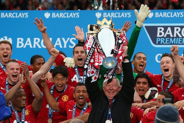 Sir Alex Ferguson lift the 2013 Premier League trophy