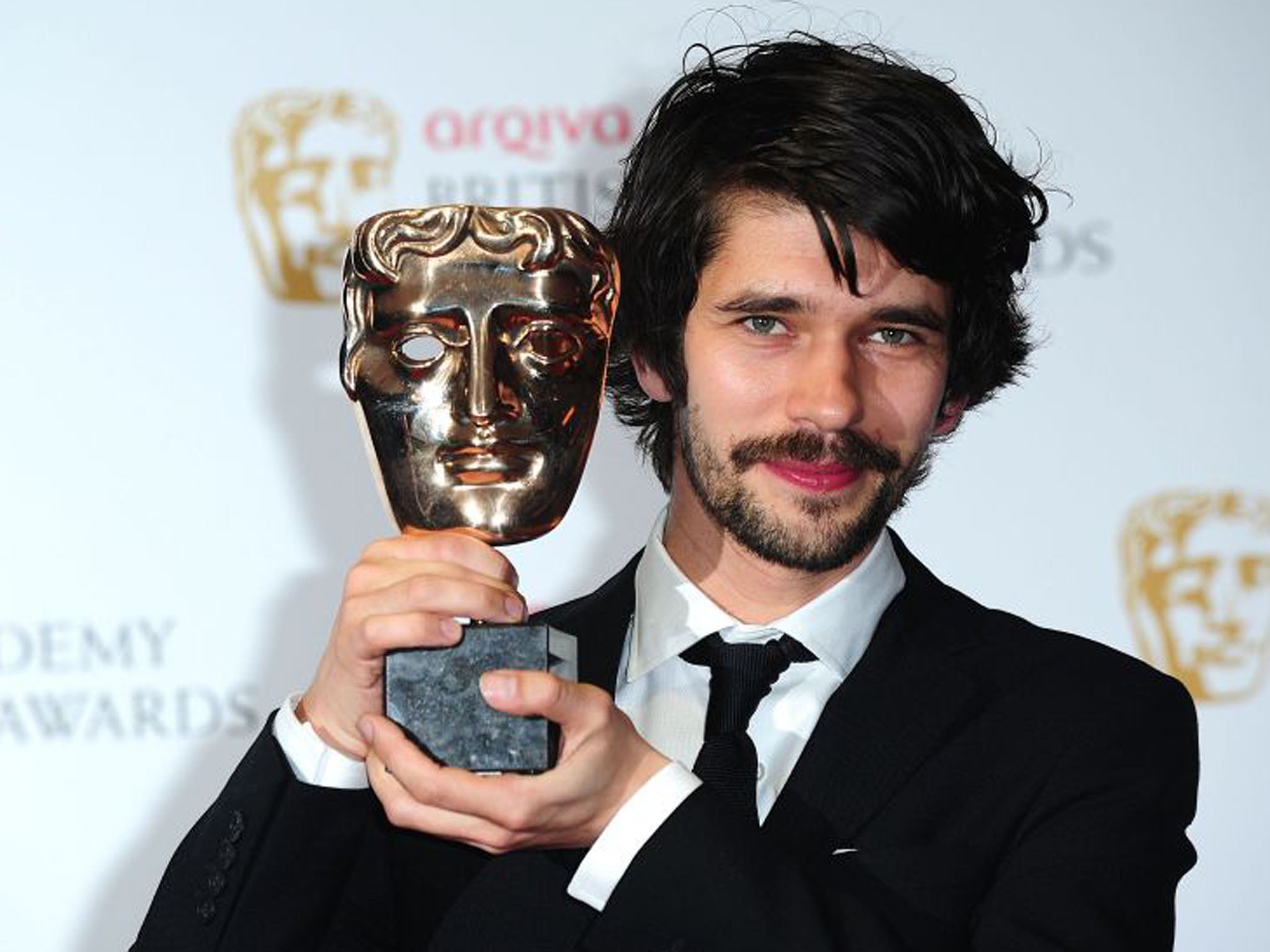 Ben Whishaw with his leading actor award for Richard II (Ian West/PA)