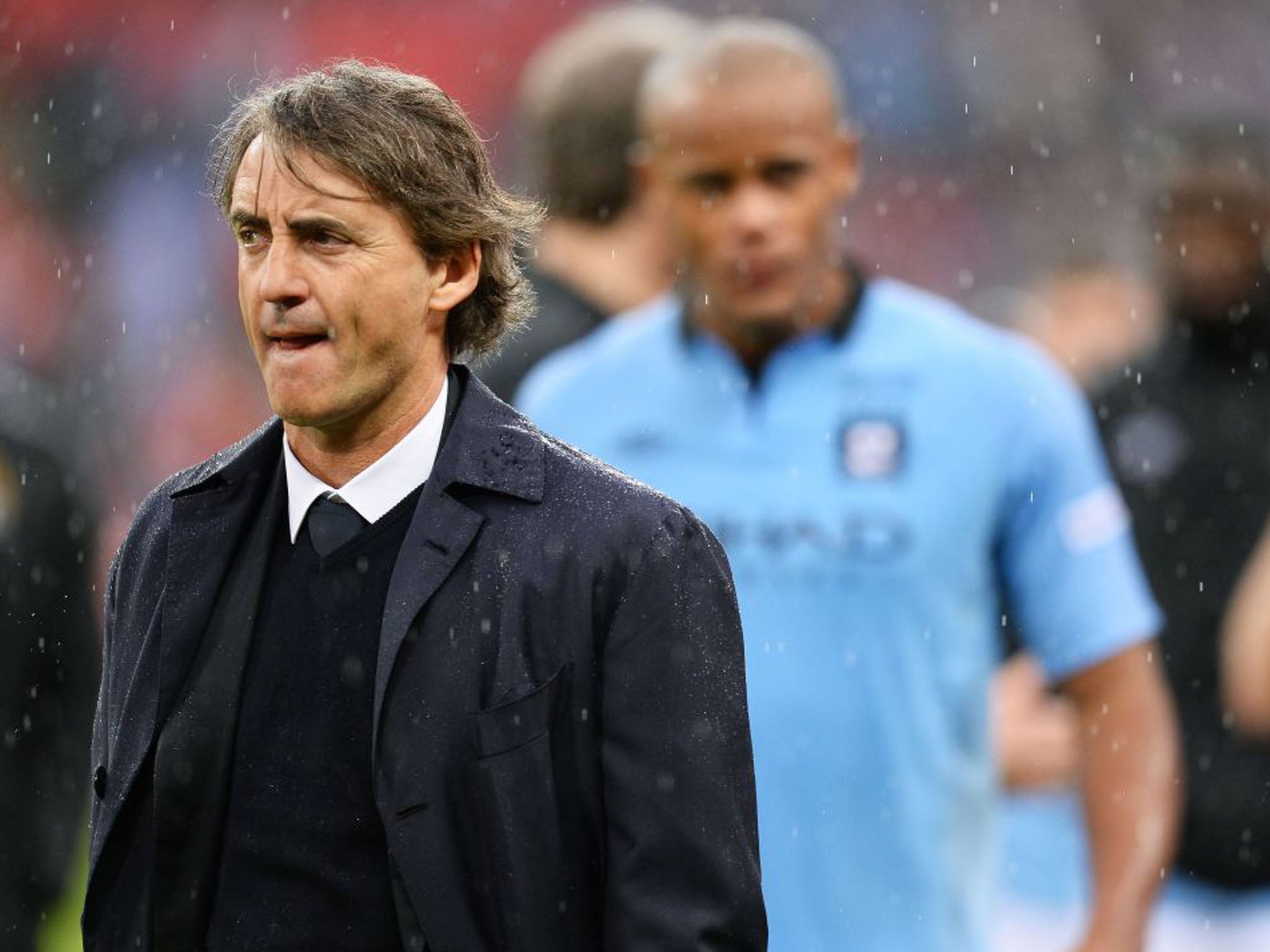 11 May 2013: Mancini looks dejected after losing the FA Cup Final to Wigan 1-0. Manchester City are also well off the pace of their main rivals in the Premier League, with Manchester United winning the title at a canter (Mike Hewitt/Getty Images)