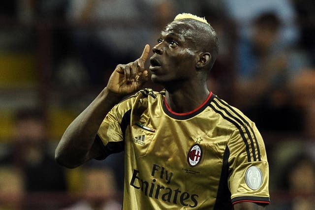 Mario Balotelli reacts to abuse from Roma fans