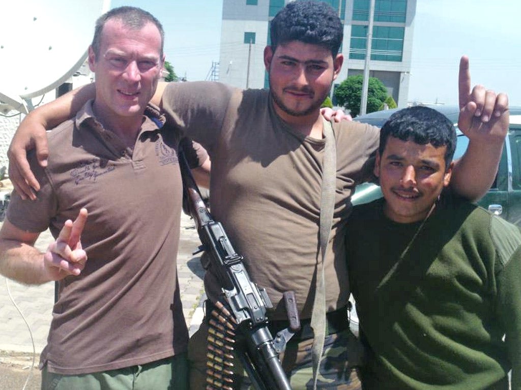 Dimitri Bontinck, left, with Syrian rebels while hunting for his son