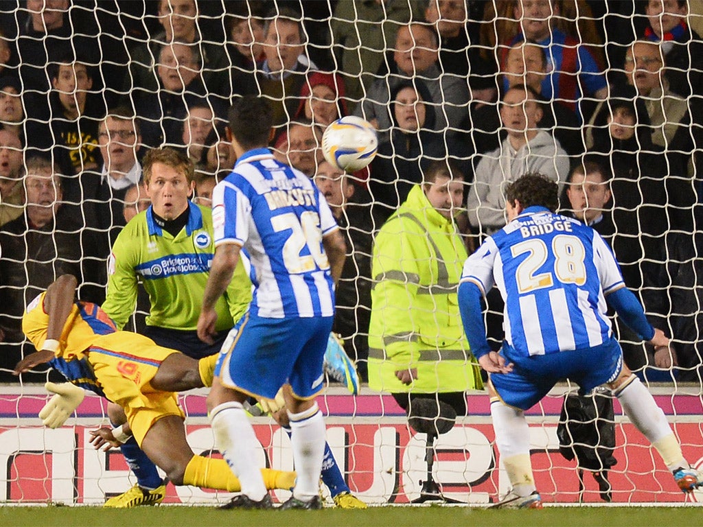 Wilfred Zaha heads the ball past Brighton keeper Tomasz Kuszczak to give Crystal Palace the lead