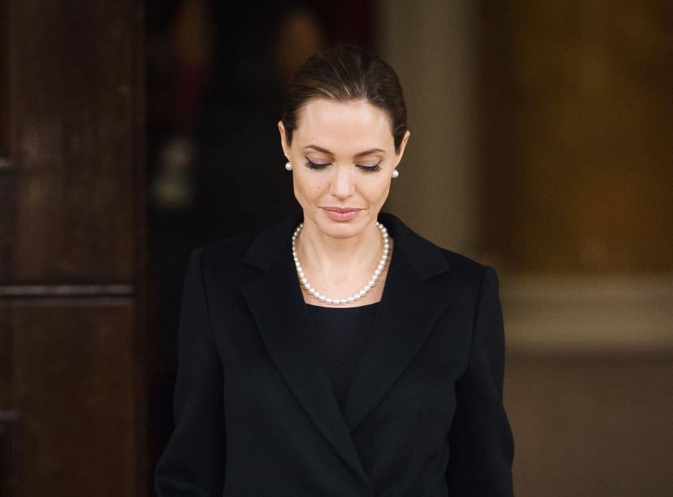 US actress and humanitarian campaigner Angelina Jolie leaves Lancaster House in central London on April 11, 2013 after speaking during an announcement of funding to address conflict sexual violence on the sidelines of the G8 Foreign Ministers meeting.