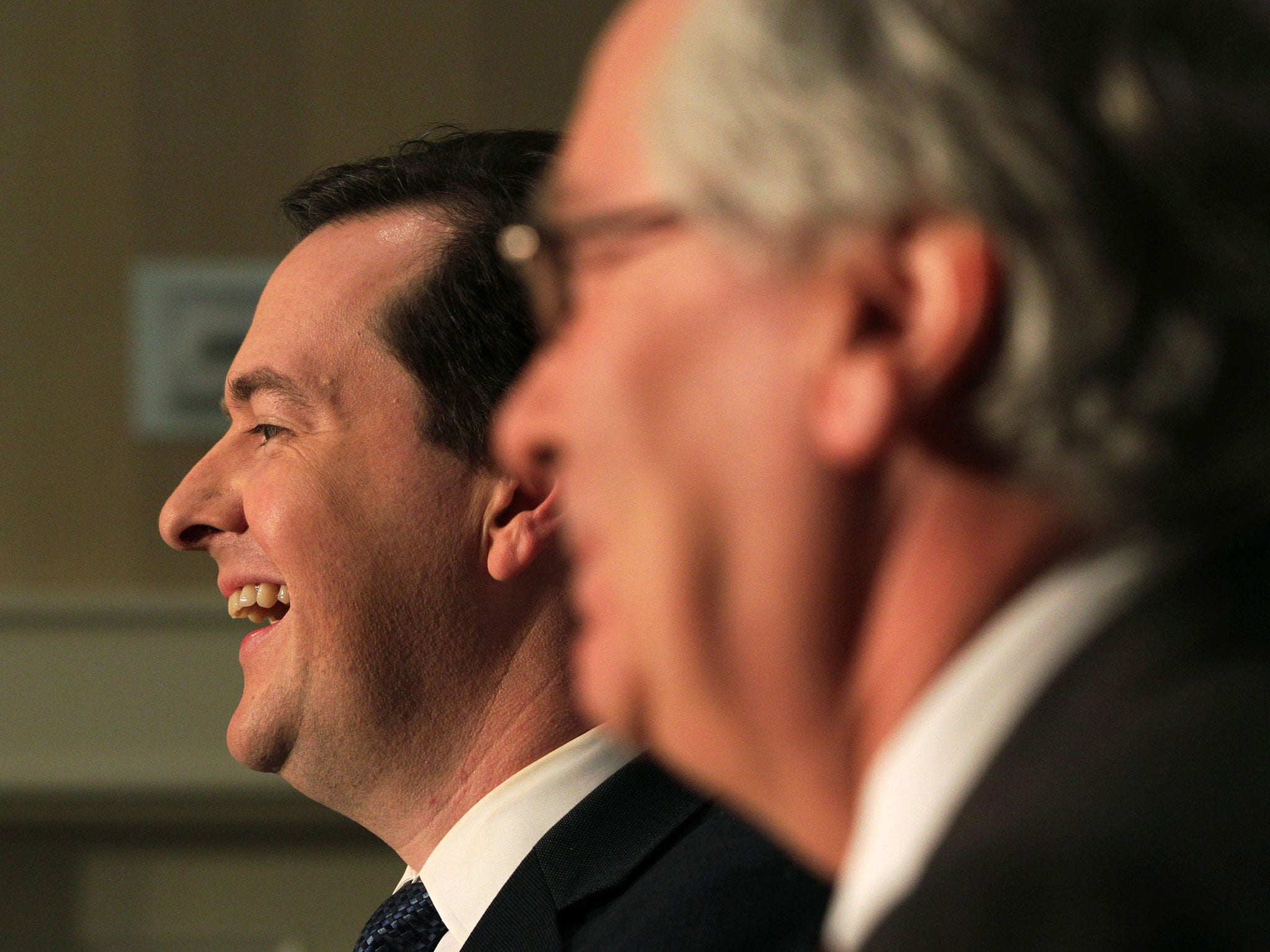 George Osborne (L) Chancellor of the Exchequer and Mervyn King, Governor of the Bank of England, attend the closing press conference of the G7 Finance Ministers and central bank governors summit at Hartwell House on May 11, 2013 Aylesbury, Buckinghamshire, England.